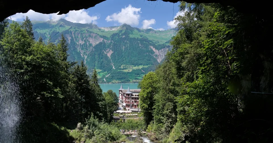 Grandhotel Giessbach seen from behind Giessbach Falls